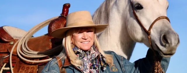 Jo’Ann Montana Cowgirl with horse in landscape